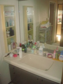 トクラス「アフェット」　グリーンのクロスが爽やかな清潔感のある洗面所施工後イメージ１