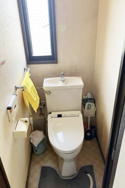 ライトブルーがアクセントの爽やかなトイレ空間施工後イメージ１