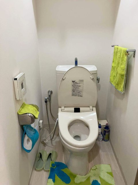 収納力抜群！ミントグリーンのクロスで爽やかなトイレ施工後イメージ１